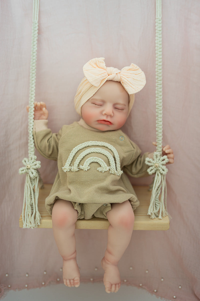 Hazel full body silicone baby doll sleeping on swing